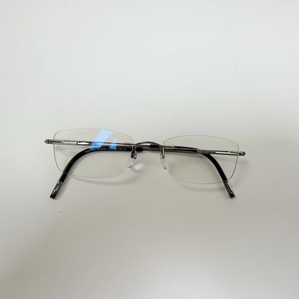 Silhouette 5521 70 7010 Titanium Silver Rimless Eyeglasses Frames 19 140 Austria